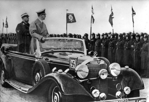 Adolf Hitler and Adolf Hühnlein in an open car on their way to the opening of the International Motor Show (IAMA) in Berlin